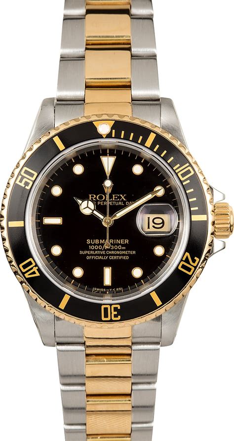 rolex black face gold and silver|Rolex submariner gold and black.